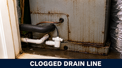Clogged AC condensate drain line causing water to leak from indoor unit